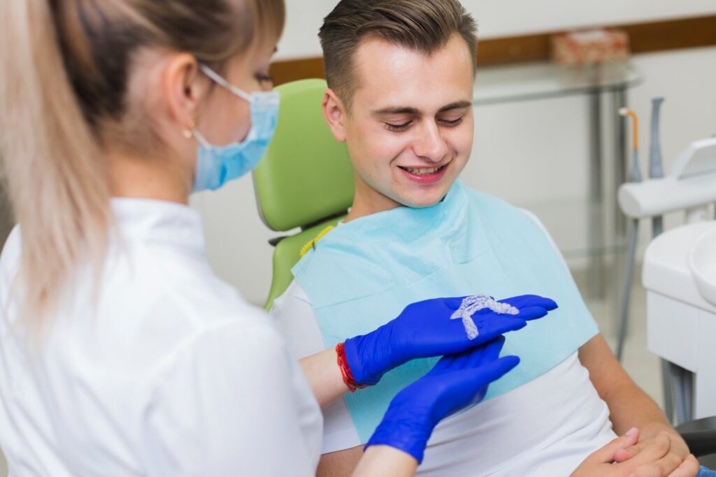 Adult patient getting Invisalign treatment from Invisalign near me dentist